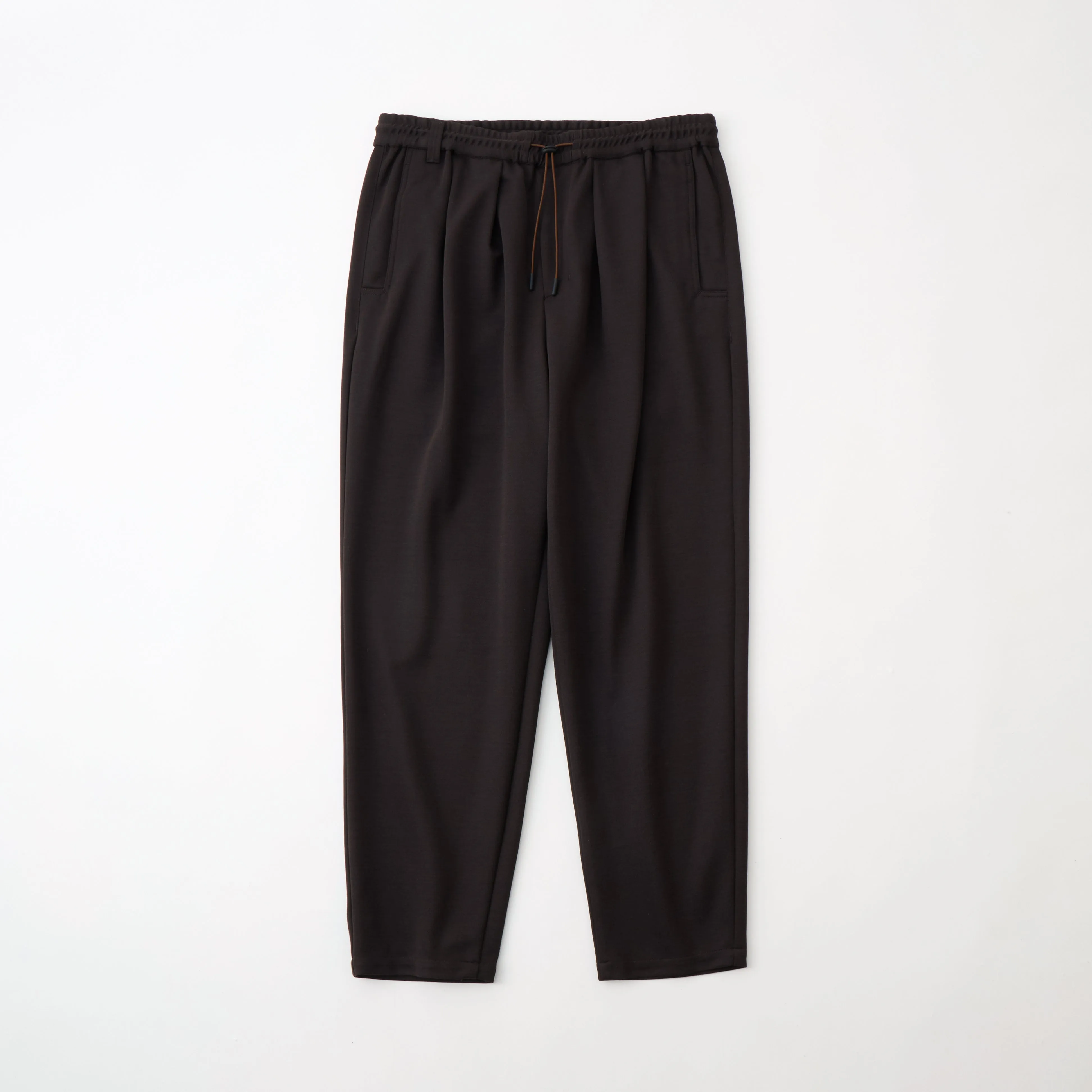 2 TUCK EASY TAPERED PANTS sold by White Mountaineering