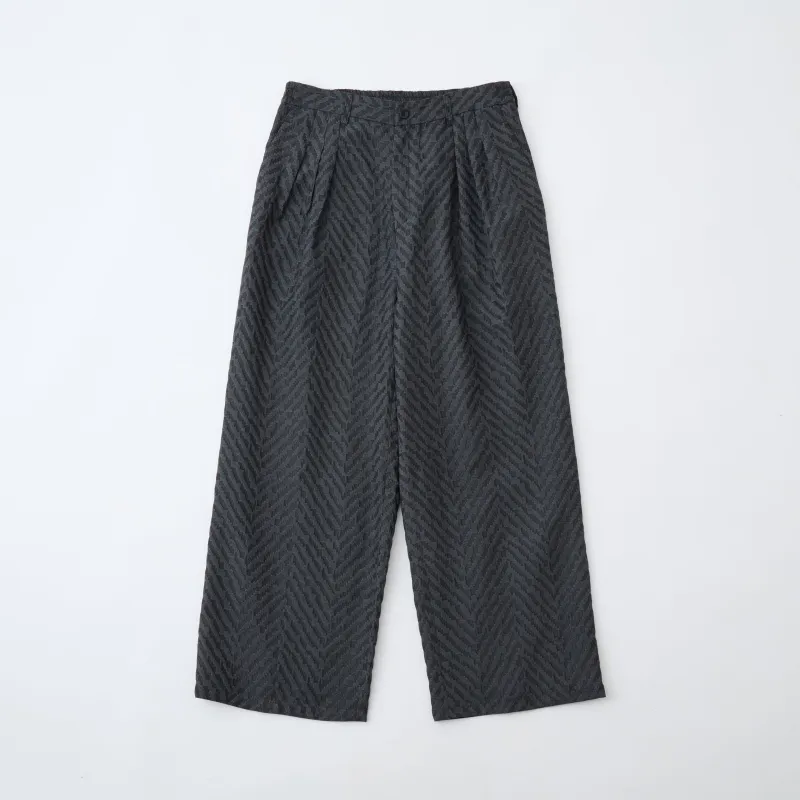 HERRINGBONE JACQUARD 3 TUCK WIDE PANTS sold by White Mountaineering