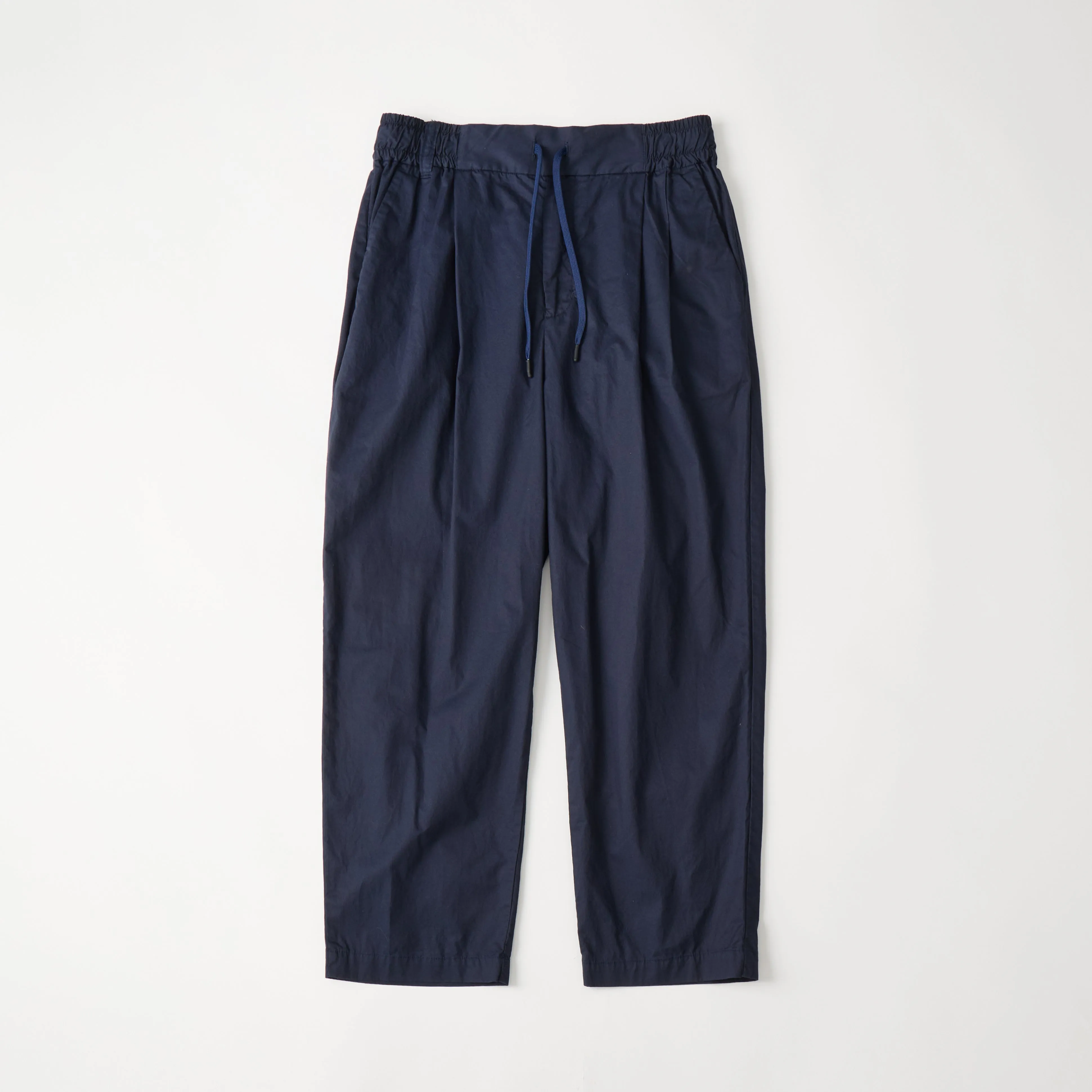 2 TUCKED WIDE PANTS sold by White Mountaineering