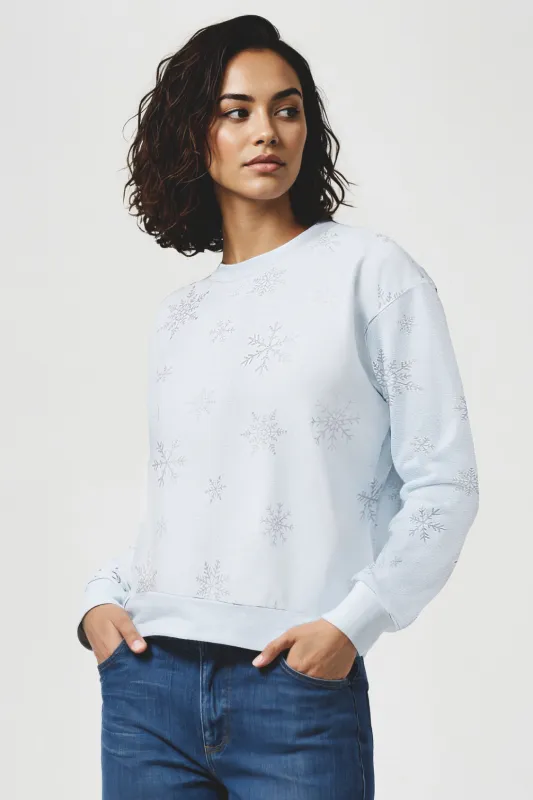 Snowflake Charlie Sweatshirt | Ballad Blue Scattered Snowflake sold by Wildfox
