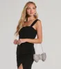 Looks So Divine Rhinestone Bow Minaudiere Clutch sold by Windsor