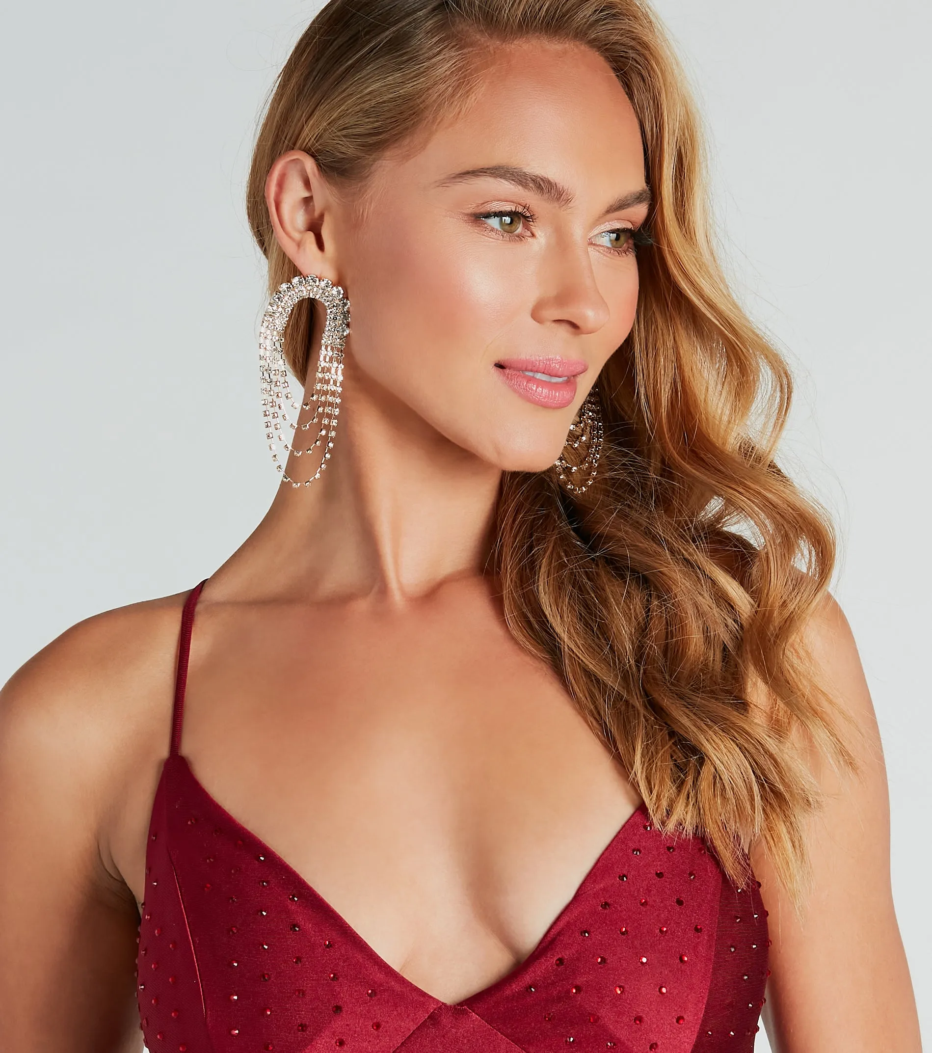 Chic Glimmer Rhinestone-Draped Statement Earrings sold by Windsor