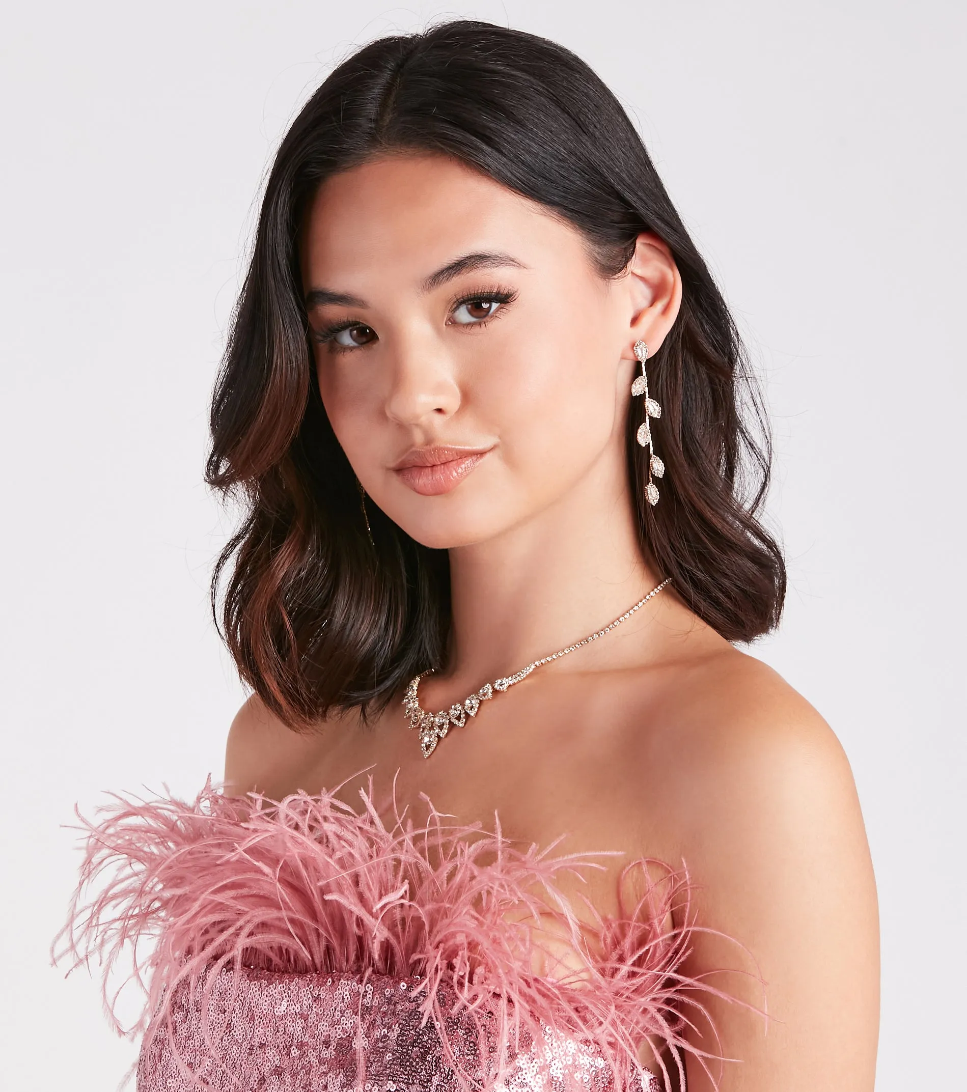 Shimmering Stunner Rhinestone Leaf Duster Earrings sold by Windsor