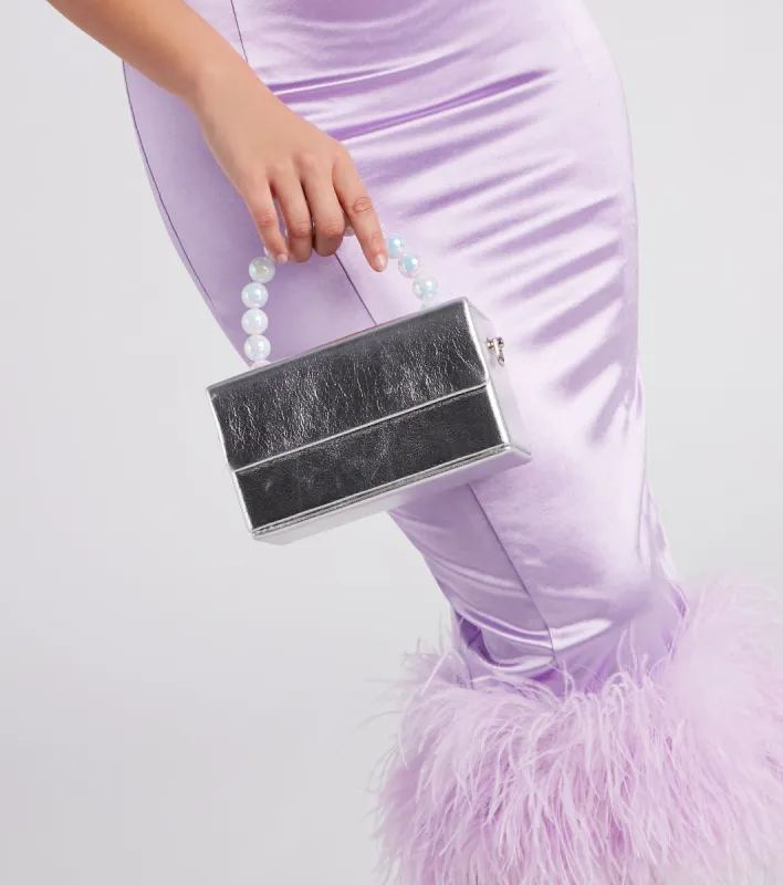 Pretty Posh Metallic Faux Pearl Handbag sold by Windsor