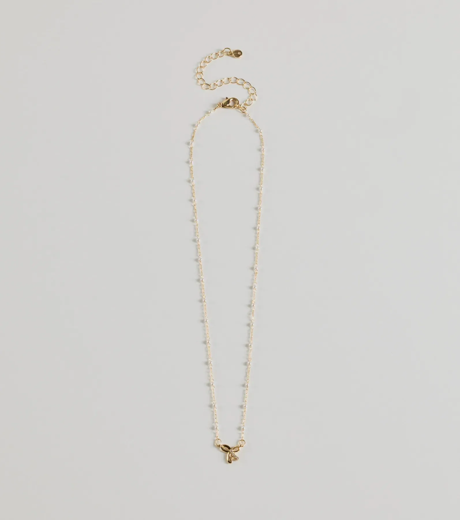 Memorable Glam Dainty Bow Charm Necklace sold by Windsor