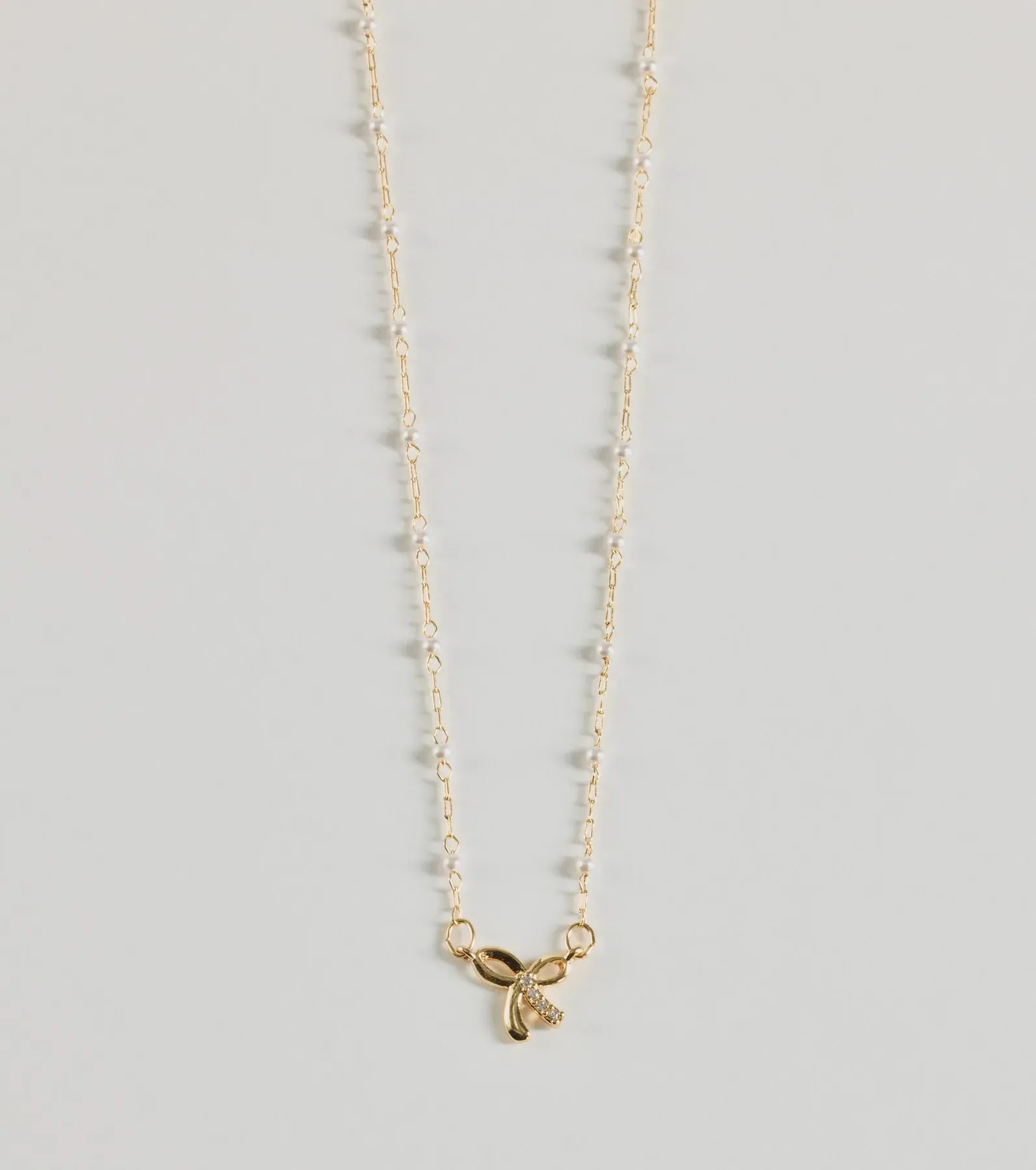 Memorable Glam Dainty Bow Charm Necklace sold by Windsor product image thumbnail 2