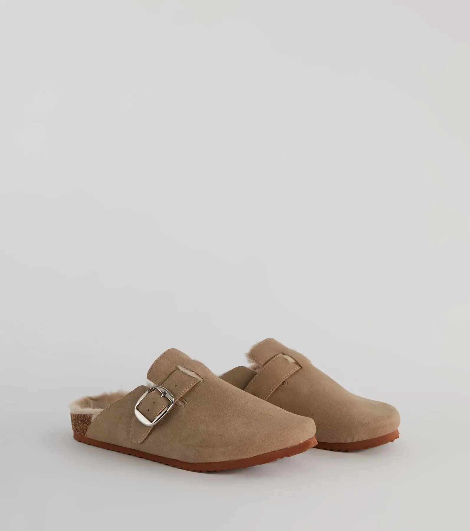 Cozy Up Faux Sherpa Lined Buckle Strap Clogs sold by Windsor