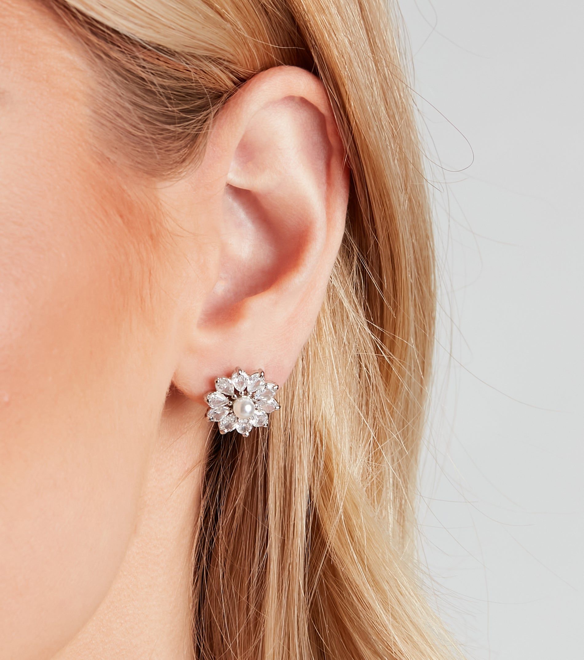 Flower Girl Stud Earrings sold by Windsor