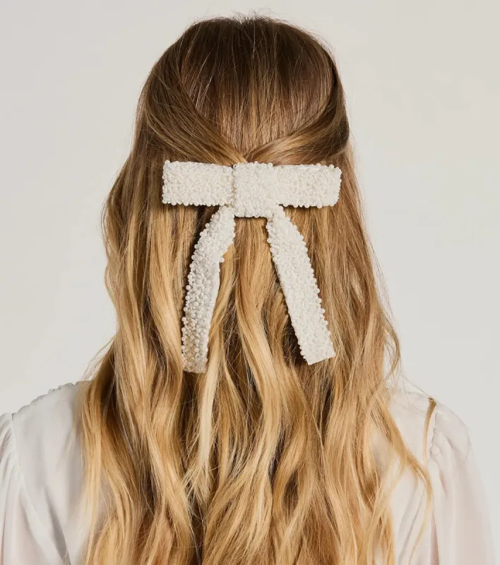 Girly-Glam Pearl Bow Hair Barrette sold by Windsor