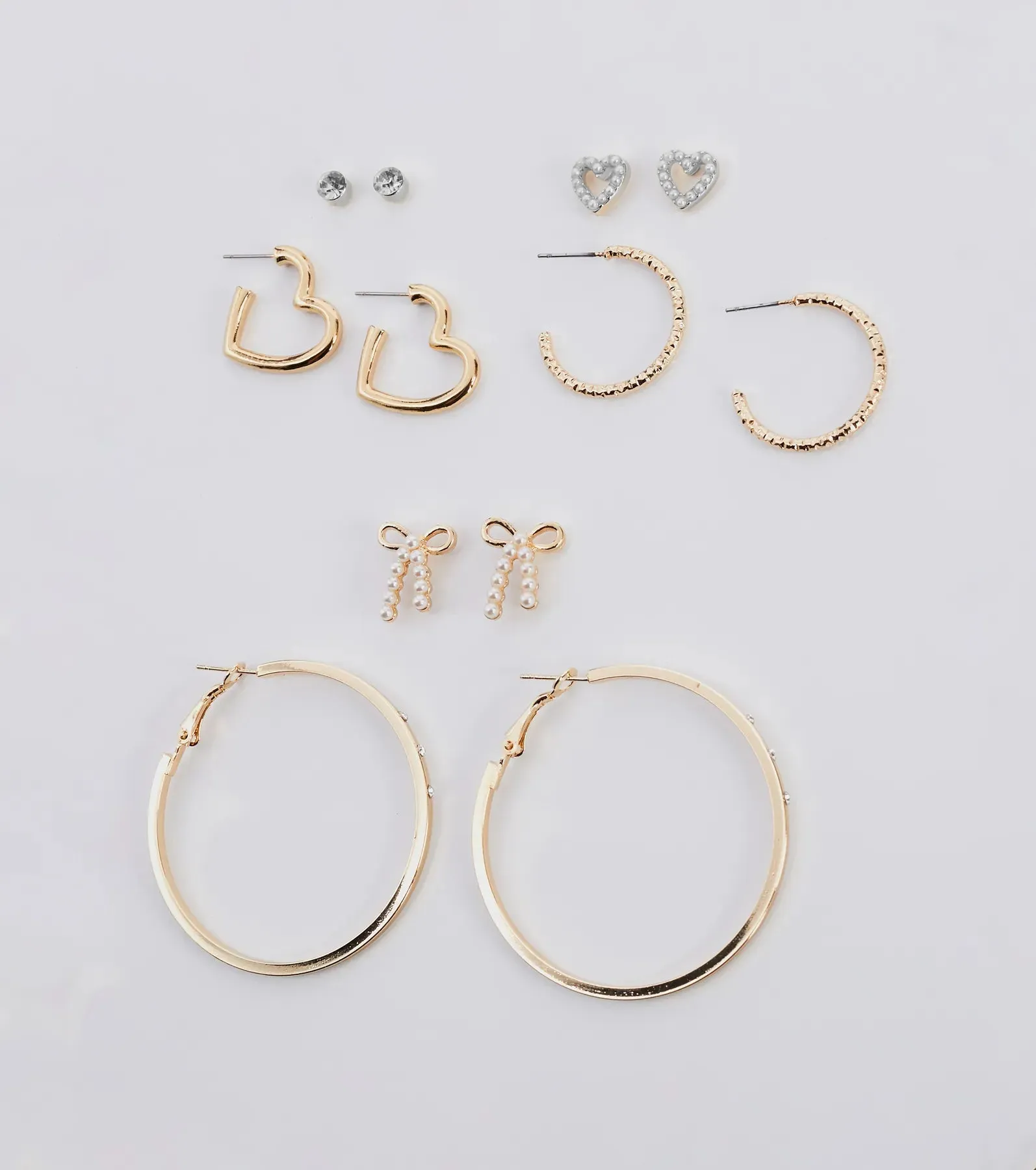 Glam Energy Stud And Hoop Earrings Set sold by Windsor