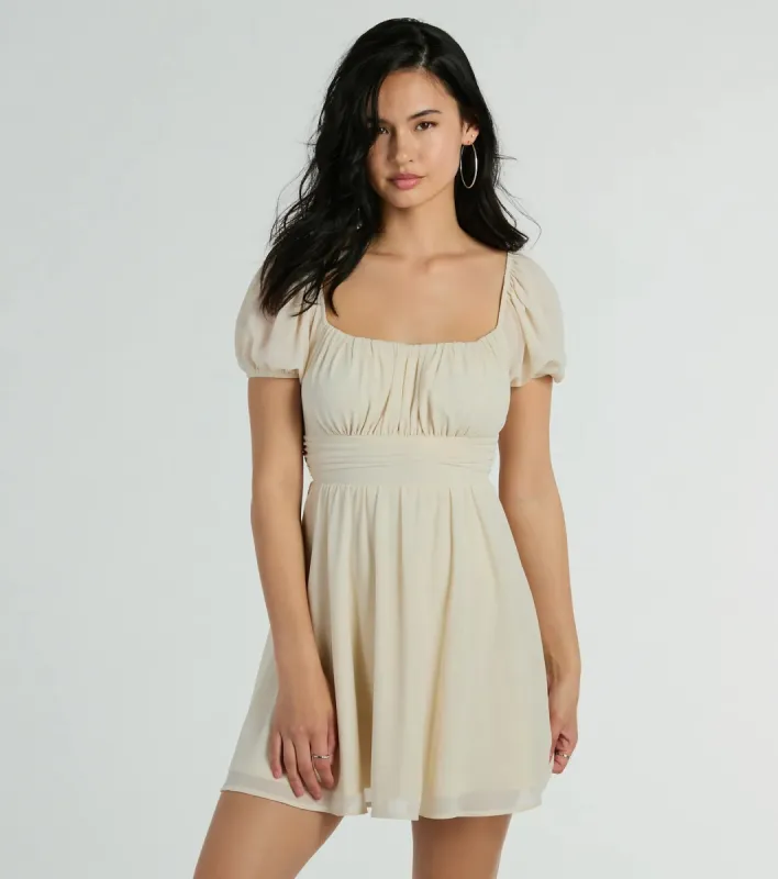Flirt And Twirl Puff Sleeve Tie-Back Skater Dress sold by Windsor