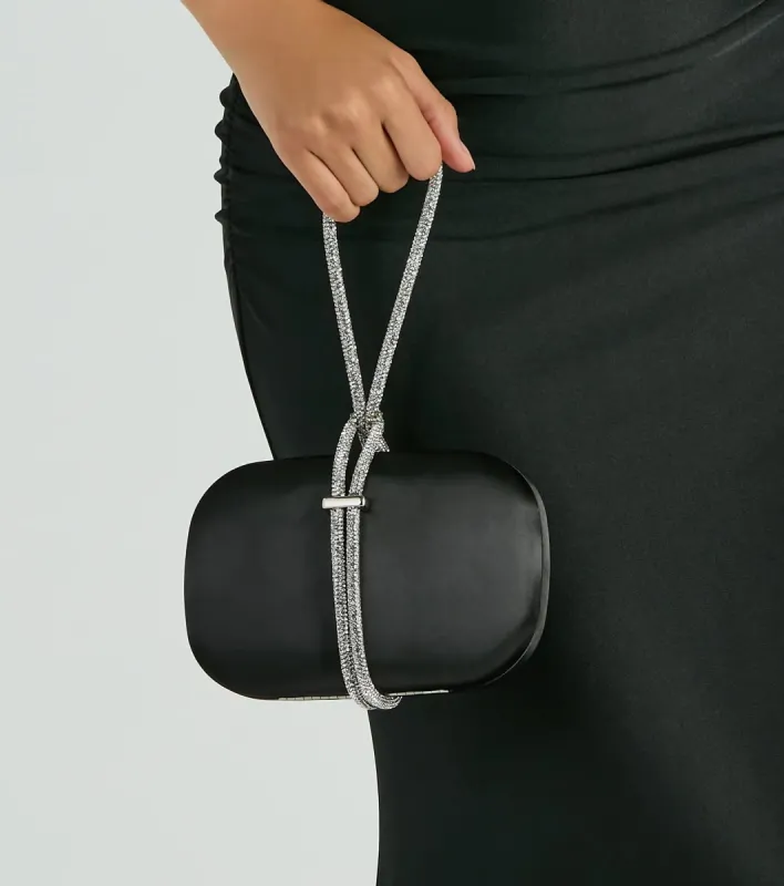Cordially Invited Rhinestone Strap Satin Clutch sold by Windsor