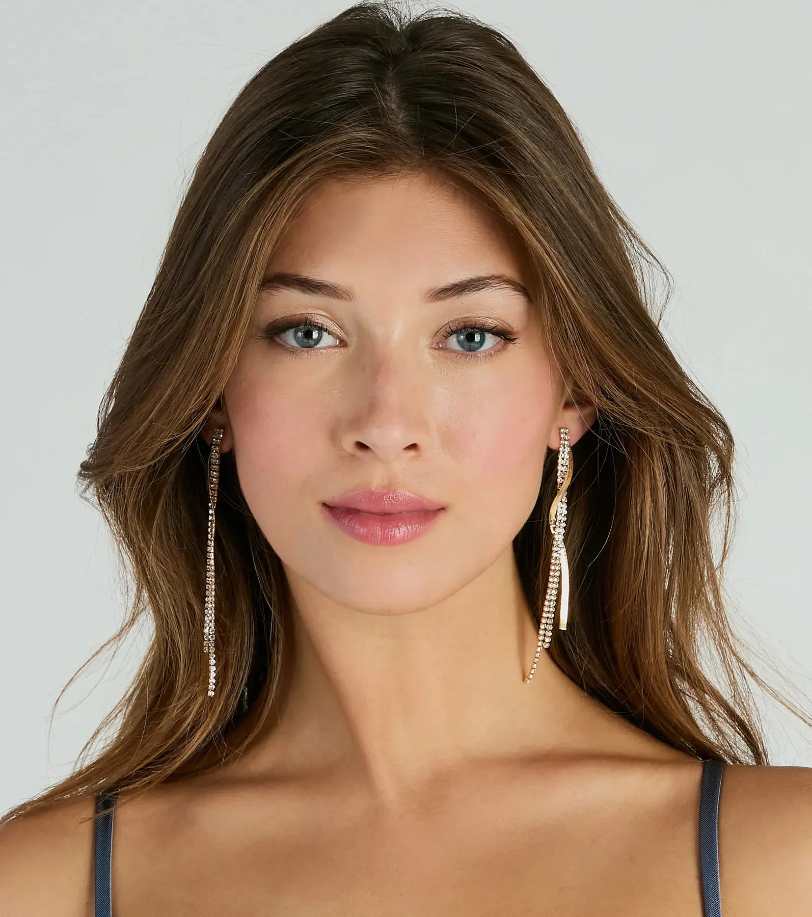 So Elevated Rhinestone Chain Twist Earrings sold by Windsor