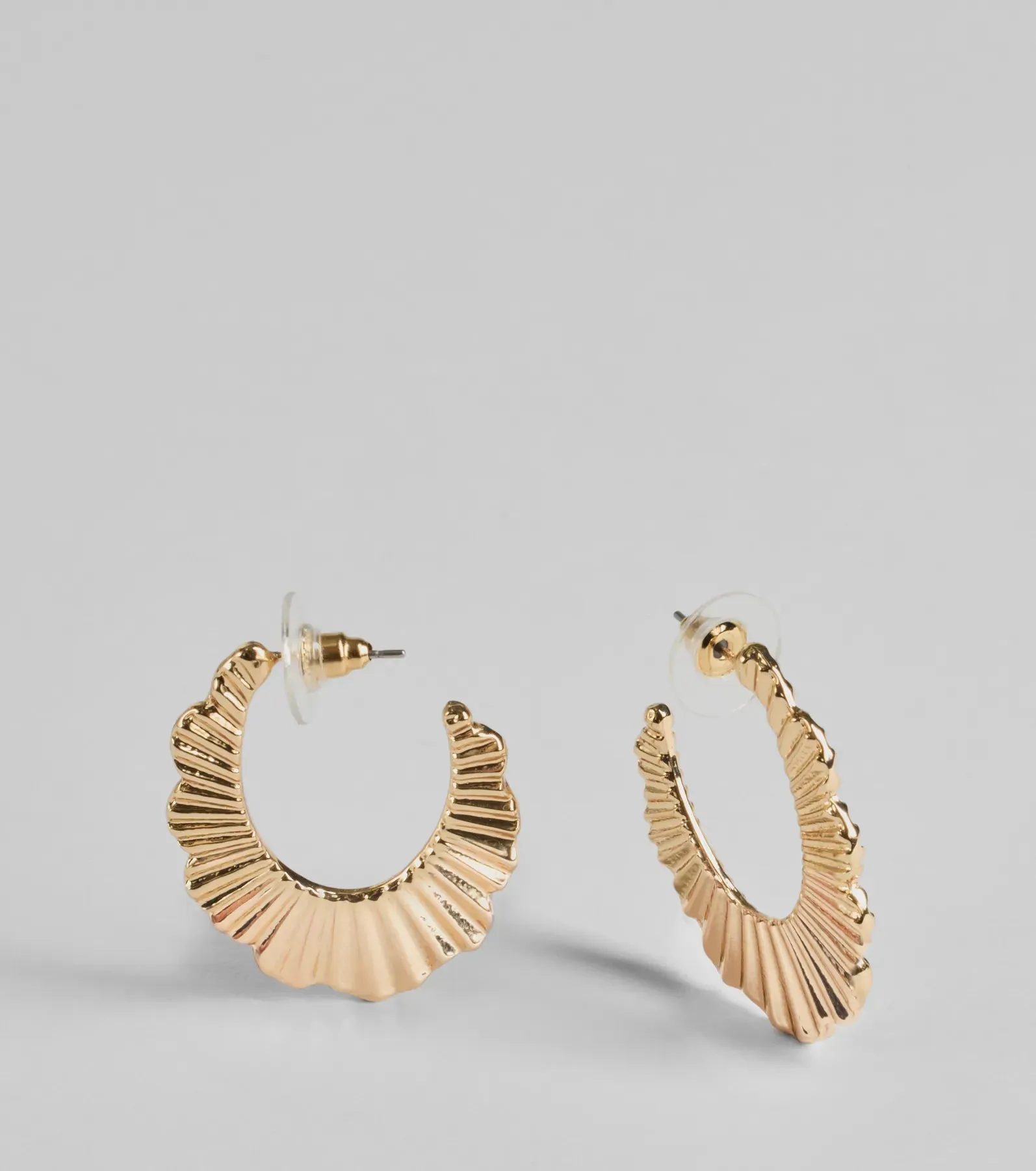 Stand Out Texture Oval Hoop Earrings sold by Windsor