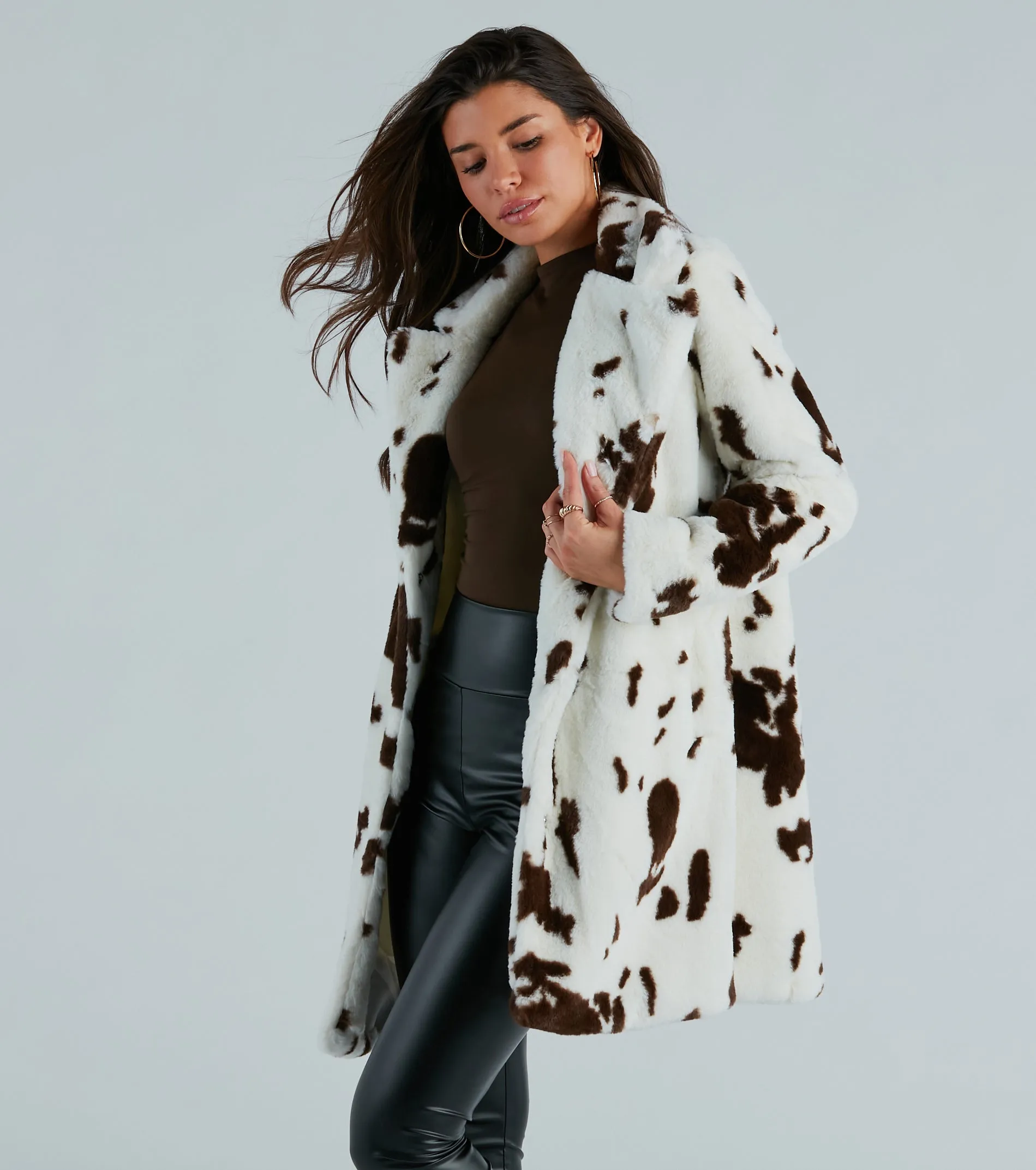 Stylishly Spotted Cow Print Faux Fur Coat sold by Windsor