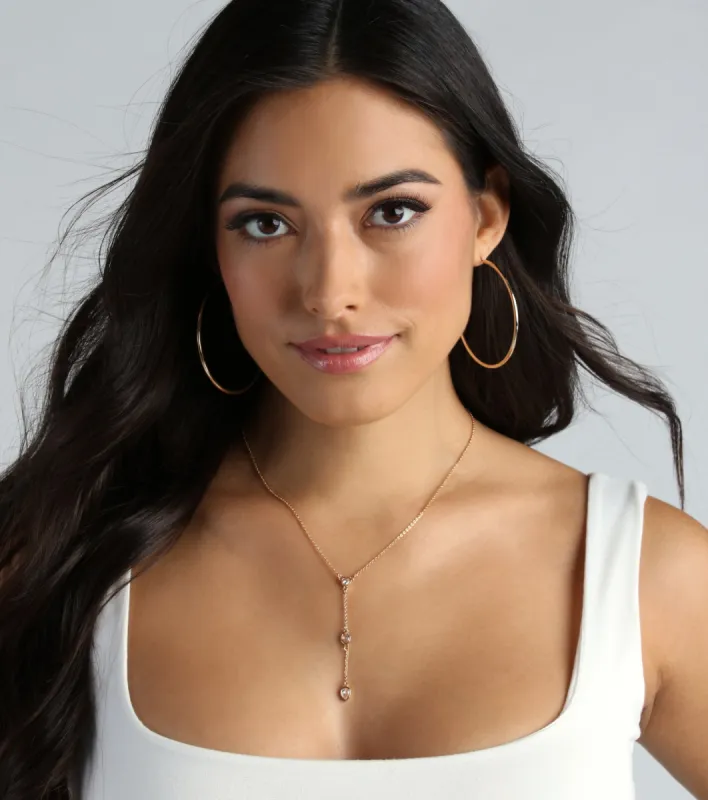Lasting Impression Rhinestone Charm Lariat Necklace sold by Windsor