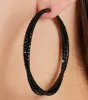 Chic Drama Rhinestone Twisted Hoop Earrings sold by Windsor