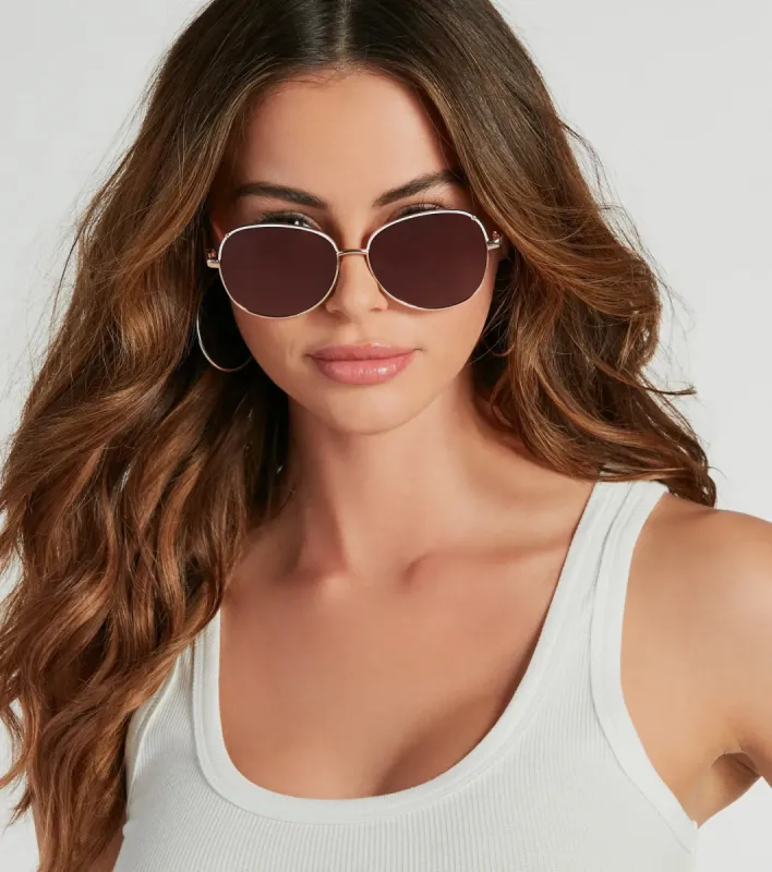 Above Average Oval Metal Trim Sunglasses sold by Windsor