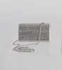 So Glam Rhinestone And Baguette Stone Clutch sold by Windsor