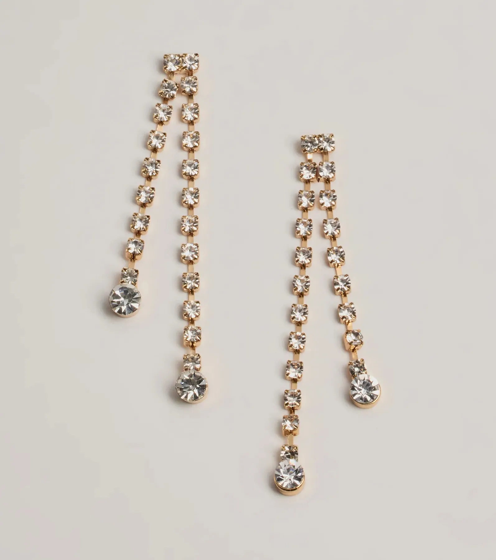 Time to Glam Tiered Fringe Rhinestone Earrings sold by Windsor