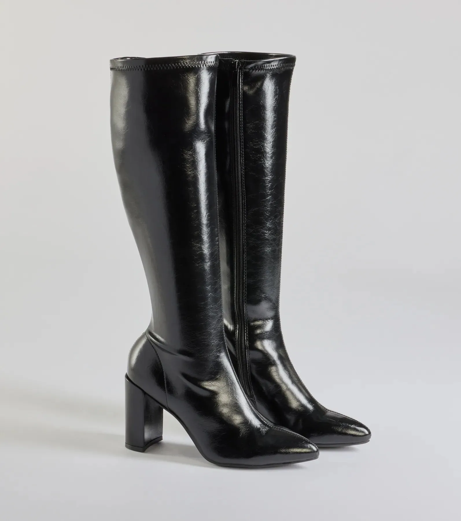 Sleek Strut Faux Leather Under-The-Knee Boots sold by Windsor