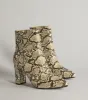 So Fierce Faux Leather Snake Print Ankle Booties sold by Windsor