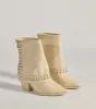 Stylishly Studded Faux Leather Fold-Over Booties sold by Windsor