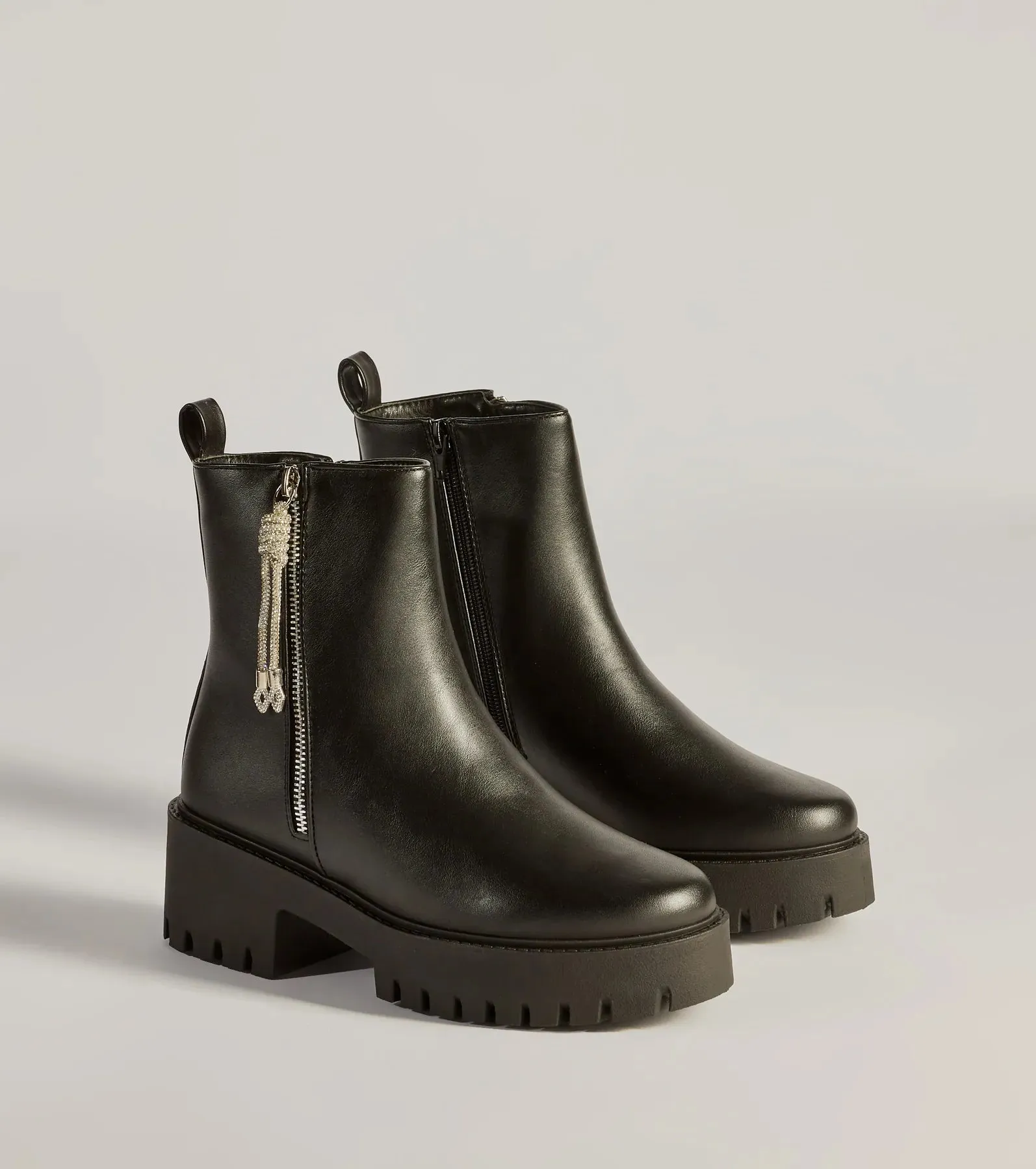 Grit And Glam Faux Leather Combat Lug Booties sold by Windsor