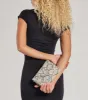 Wildly Fab Faux Snake Print Wristlet sold by Windsor