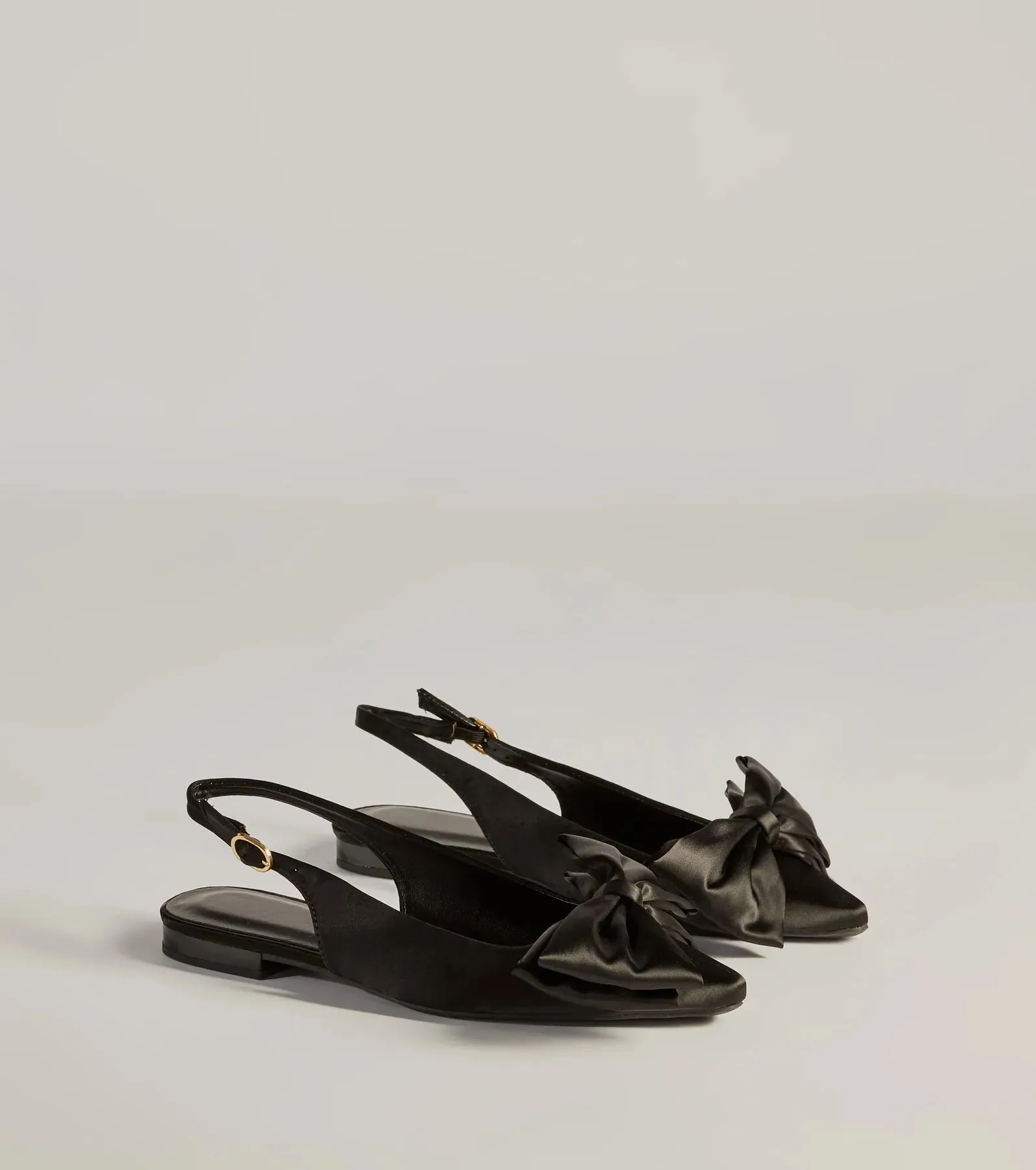 Elegant Charm Faux Leather Bow Flats sold by Windsor