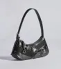 Bold Buckles Faux Leather Handbag sold by Windsor