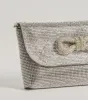 Sparkle And Glow Rhinestone Bow Handbag sold by Windsor