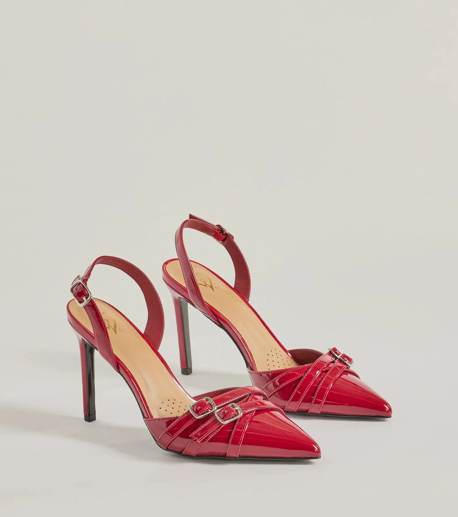 Sleek Buckle Strap Sling-Back Stiletto Pumps sold by Windsor