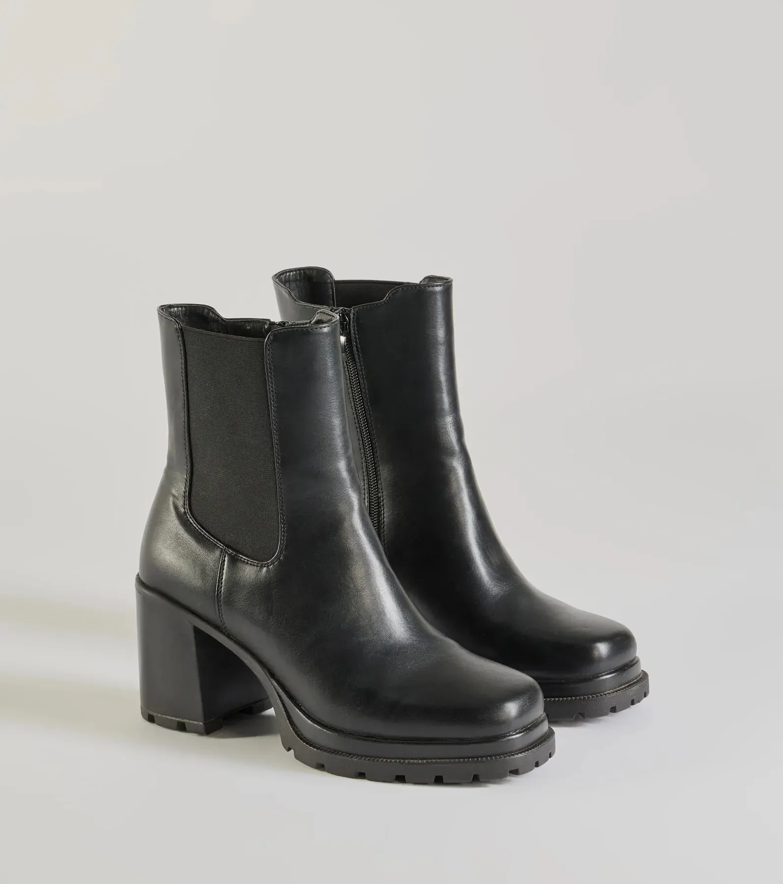 Edgy Strut Faux Leather Platform Booties sold by Windsor