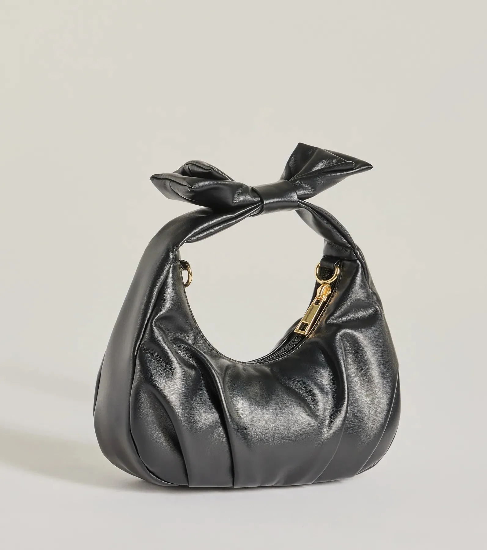 Chic Muse Faux Leather Bow Handbag sold by Windsor