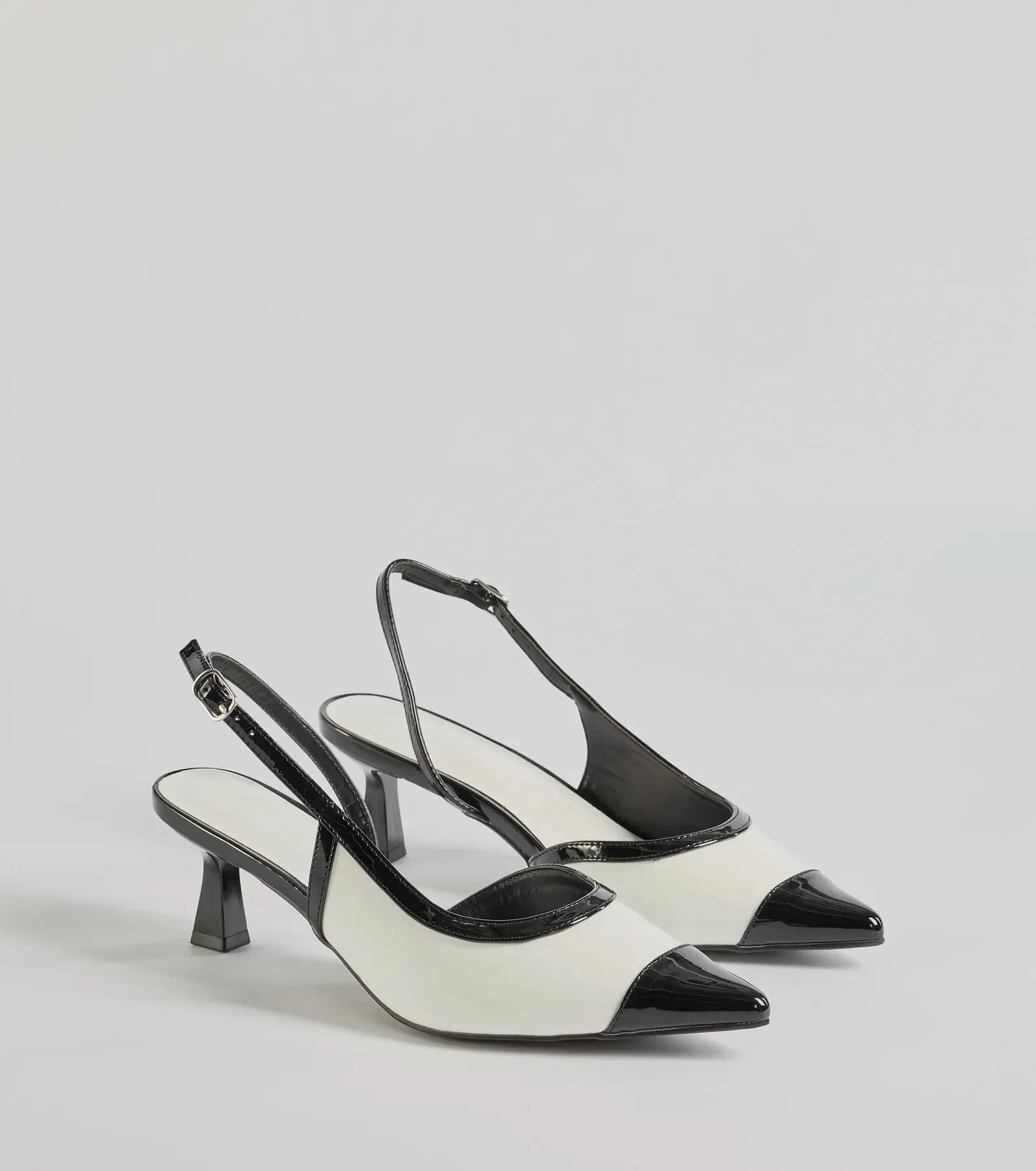 Chic Icon Sling-Back Kitten Heel Pumps sold by Windsor