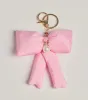 Cutest Detail Pearl Beaded Bow Bag Charm sold by Windsor