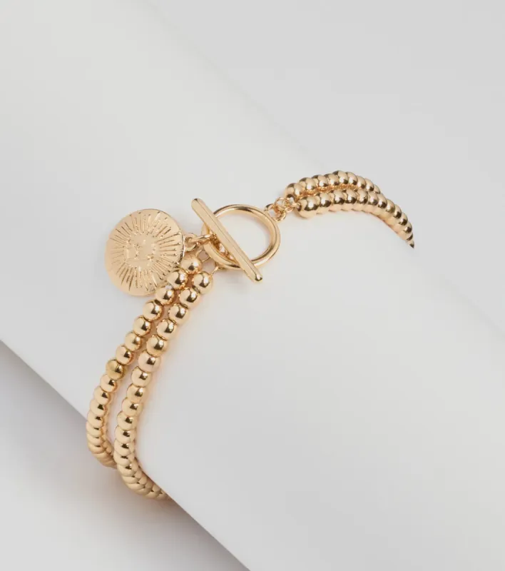 Trend Alert Beaded Coin Bracelet sold by Windsor