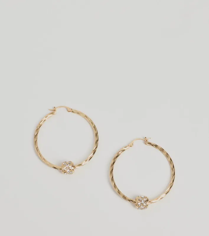 Glitzy Touch Rhinestone Twisted Hoop Earrings sold by Windsor