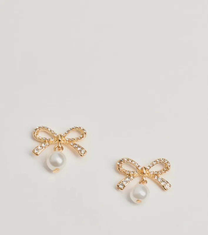 Sweet Moments Rhinestone Bow And Faux Pearl Earrings sold by Windsor