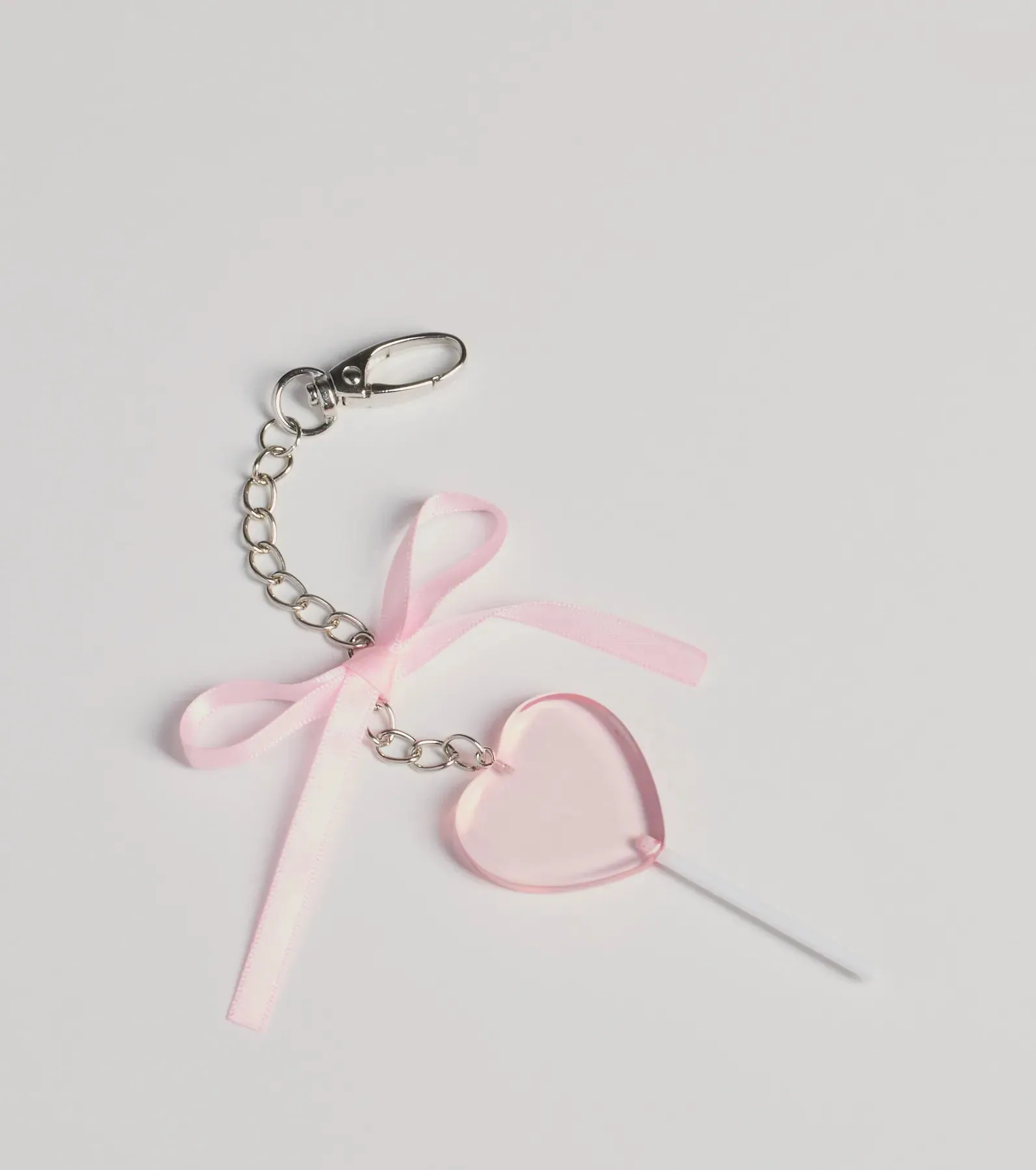 Total Sweetie Heart Lollipop And Bow Bag Charm sold by Windsor