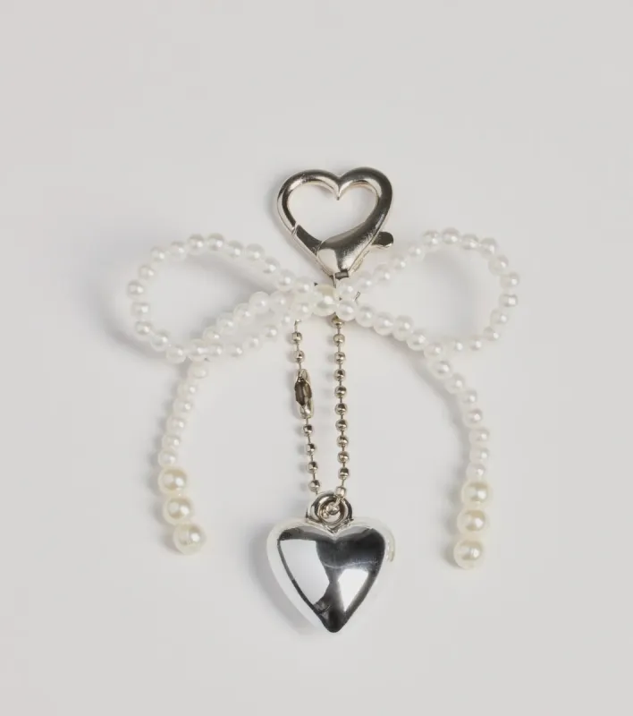 So Luxe Faux Pearl Bow And Heart Bag Charm sold by Windsor