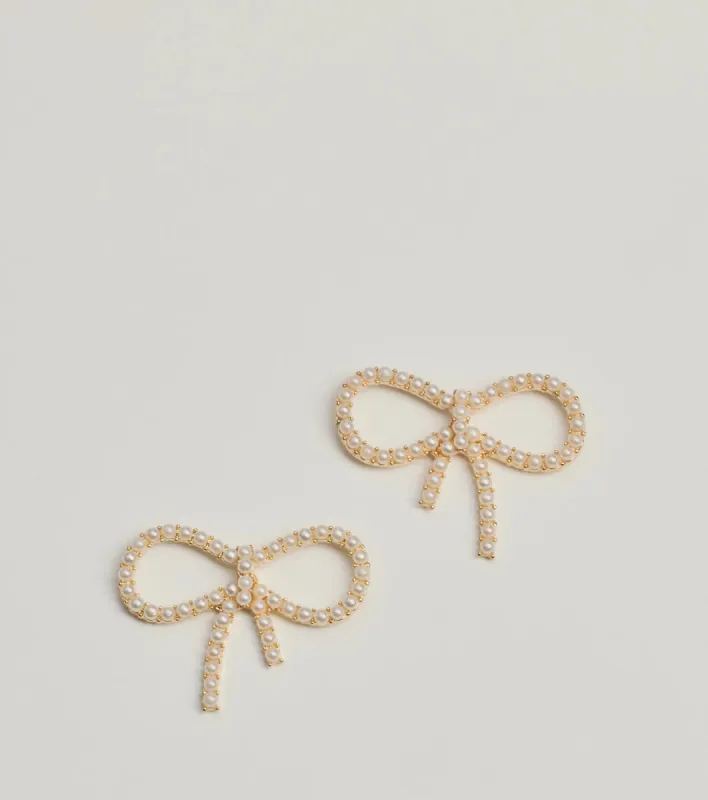 Sealed With Glam Faux Pearl Bow Earrings sold by Windsor