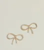 Delicate Glam Rhinestone Bow Earrings sold by Windsor