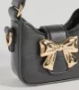 Treat Yourself Bow Accent Mini Handbag sold by Windsor