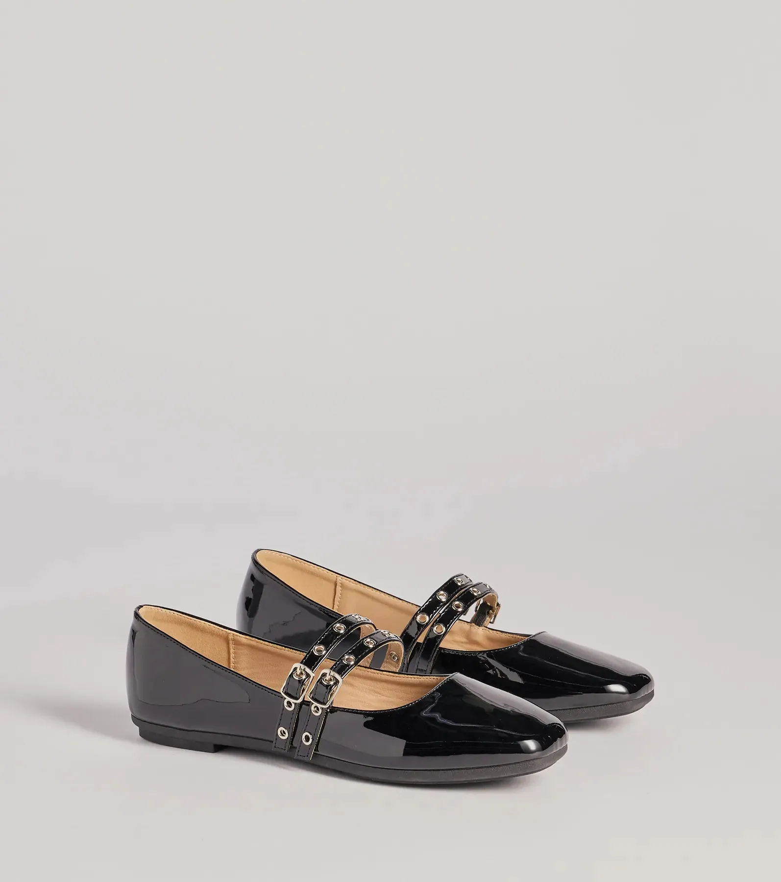 Sleek Buckled Strappy Patent Faux Leather Flats sold by Windsor