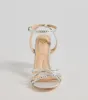 Step Out And Sparkle Rhinestone Strappy Block Heels sold by Windsor