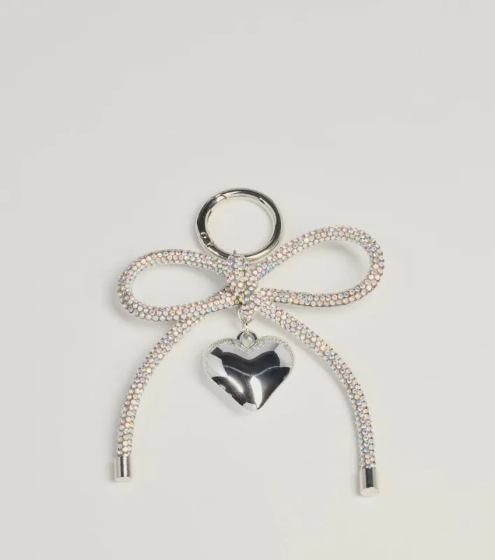 Glam Shine Rhinestone Bow And Heart Bag Charm sold by Windsor