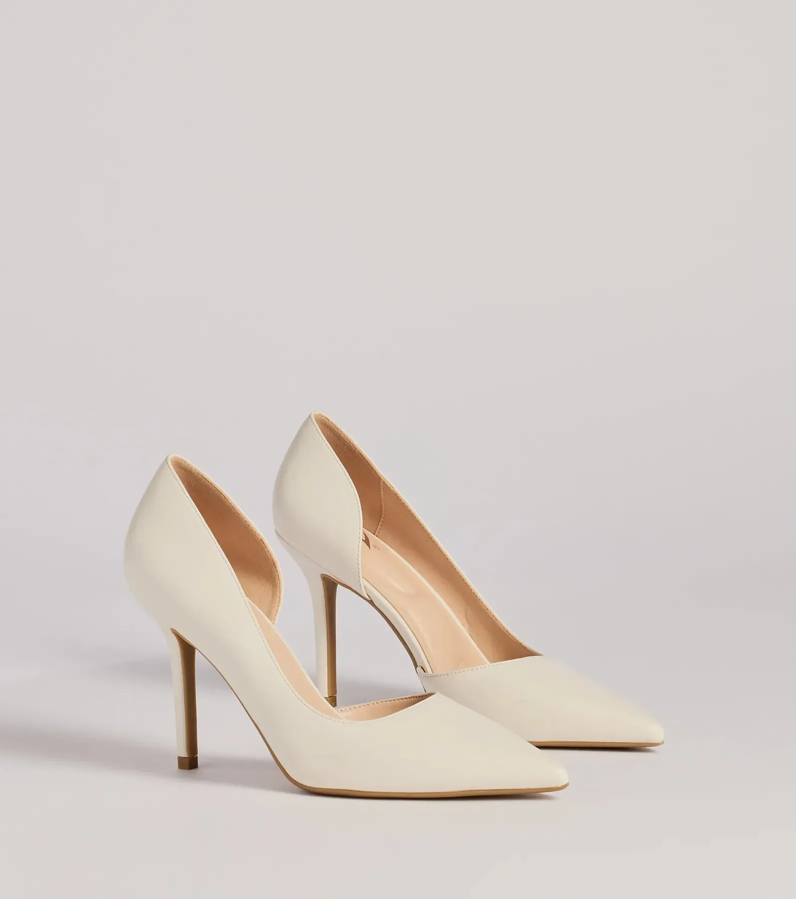Classic Sleek Faux Leather Cutout Pumps sold by Windsor