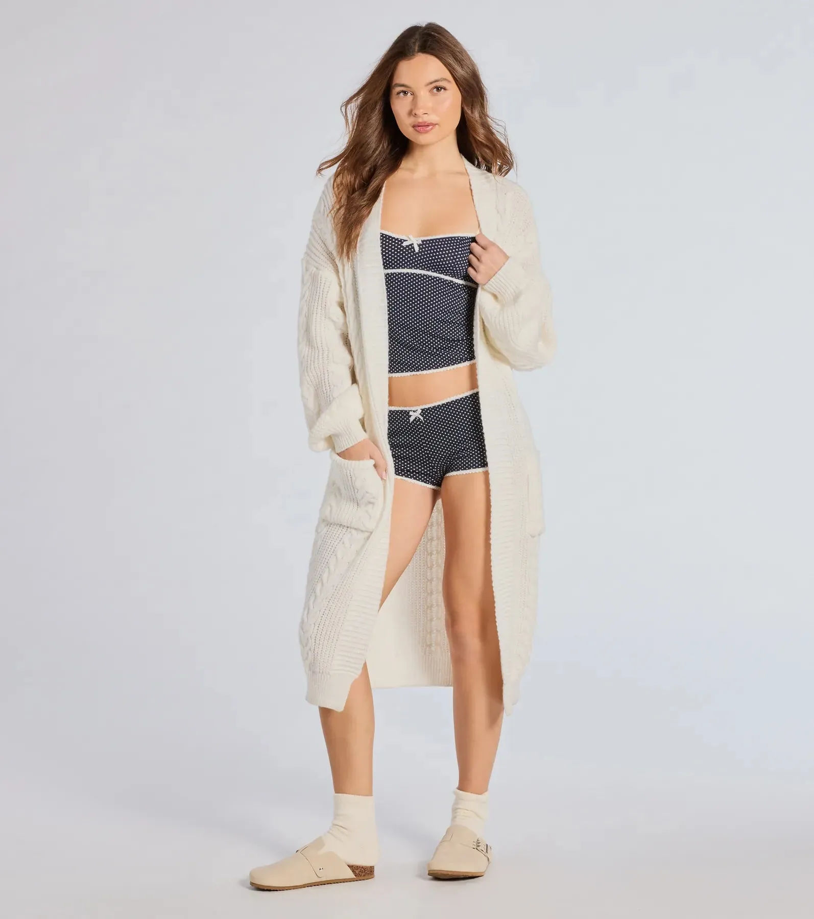 Layer On The Cute Cable Knit Duster Sweater sold by Windsor